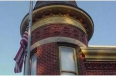 Flag in front of a historic building