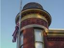 Flag in front of Memorial Opera House tower
